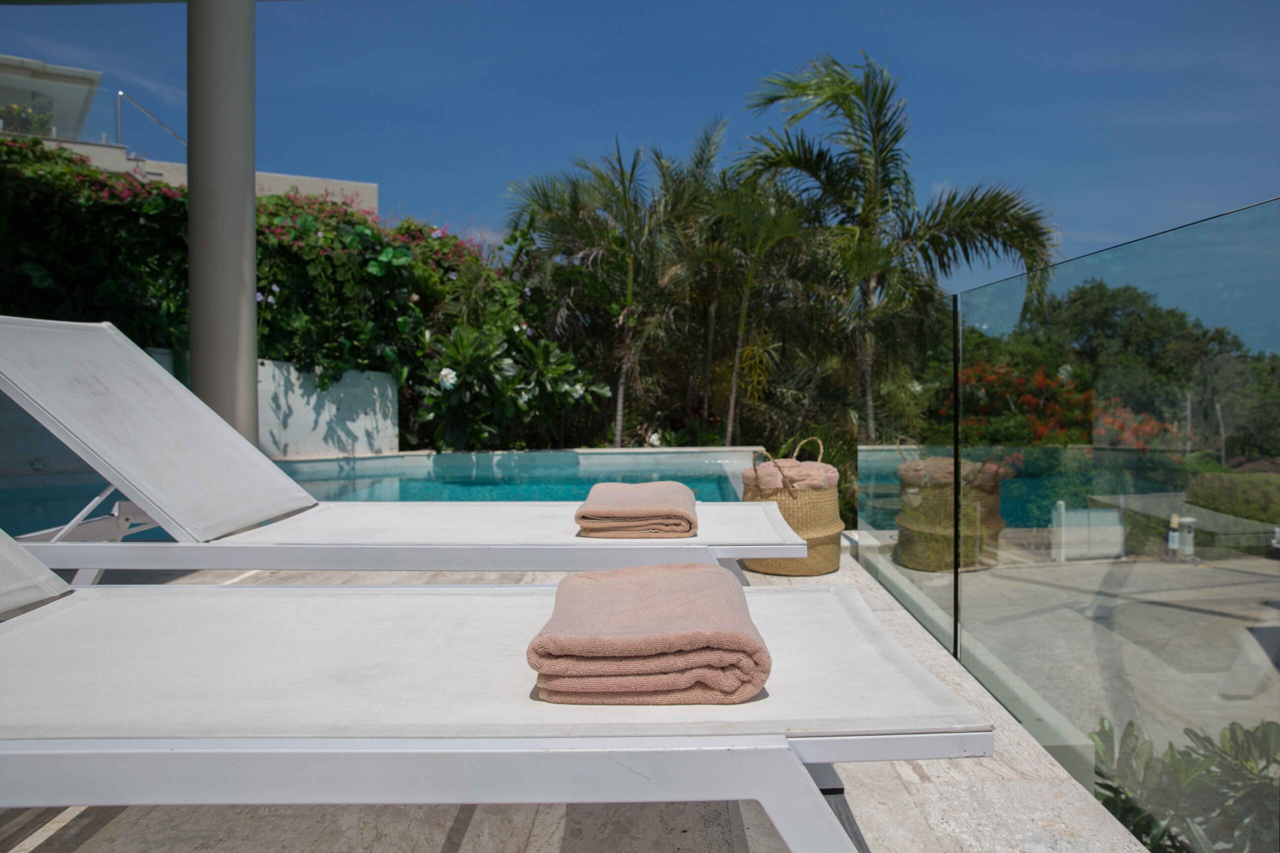 Lounge chairs by the pool at Lemon Twist House, Koh Samui